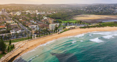 Panoramic drone aerial view over Dee Why beach and Dee Why lagoon, Northern Beaches Sydney NSW Australia