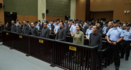 A Chinese court sentencing 11 people to death for running a family-run criminal empire in Myanmar and for killing workers who tried to escape in Zhejiang, China on September 29, 2025.