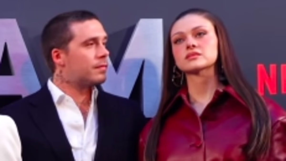 Clip of Nicola Peltz being pulled into Beckham family snap goes viral