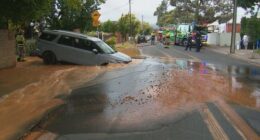 A couple's drive to the airport has taken a shocking turn after their hire car fell into a large sinkhole in Adelaide.
