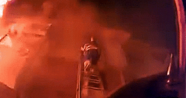 Dramatic Michigan apartment fire rescue seen on helmet cam