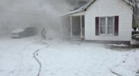 Firefighters battle early morning fire in Arthur, rescue 2 cats