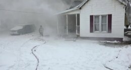 Firefighters battle early morning fire in Arthur, rescue 2 cats