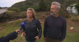 Melanie and Martin were arriving at their Separation Creek home when the water came screaming through on Thursday.