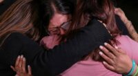 Mothers of Robb Elementary School shooting victims, from left, Sandra Torres, Veronica Luevanos, and Felicha Martinez cry together outside the Nueces County Courthouse on Wednesday, Jan. 21, 2026, in Corpus Christi, Texas, after former Uvalde school district police officer Adrian Gonzales was found not guilty. (Sam Owens/The San Antonio Express-News via AP, Pool)
