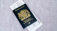 London, United Kingdom - March 7th, 2023 :   A new blue British passport with an airline boarding pass.  Since the United Kingdom has left the European Union in 2020, new British passports have returned to their original blue colour.