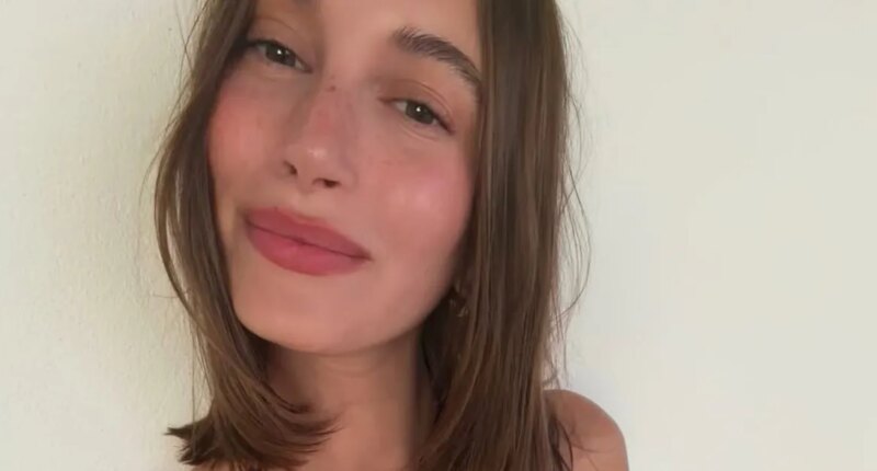 Hailey Bieber Flaunts Her Washboard Abs in a Strappy Leopard-Print Swimsuit