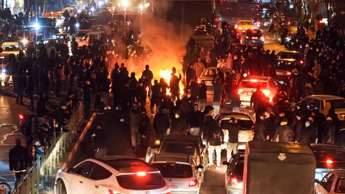 People gather during protest on January 8, 2026 in Tehran, Iran. Demonstrations have been ongoing since December, triggered by soaring inflation and the collapse of the rial, and have expanded into broader demands for political change.