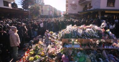 Hundreds march in silence to honor victims of Switzerland bar fire that left 40 dead on New Year's Eve
