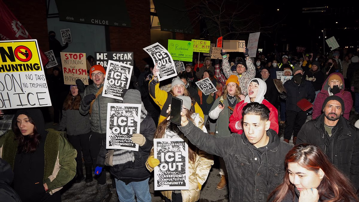 Hundreds of masked anti-ICE protesters besiege Minneapolis hotel