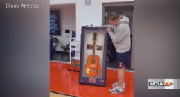 Illinois basketball team presents framed smashed guitar to Underwood