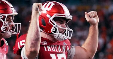 Indiana completes undefeated season and wins first national title, beating Miami 27-21 in CFP final