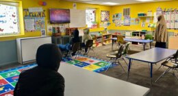 FILE - Children watch television at ABC Learning Center in Minneapolis, Minn., Dec. 31, 2025. (AP Photo/Mark Vancleave, File)