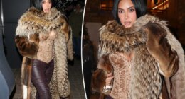Kim Kardashian heats up Aspen in velvet corset and lace-up leather pants