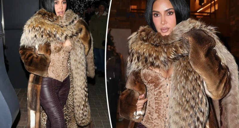 Kim Kardashian heats up Aspen in velvet corset and lace-up leather pants