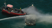 Firefighters fought the blaze from two fire boats.