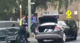 Police were seen taking at least one person from the scene.