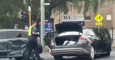 Police were seen taking at least one person from the scene.