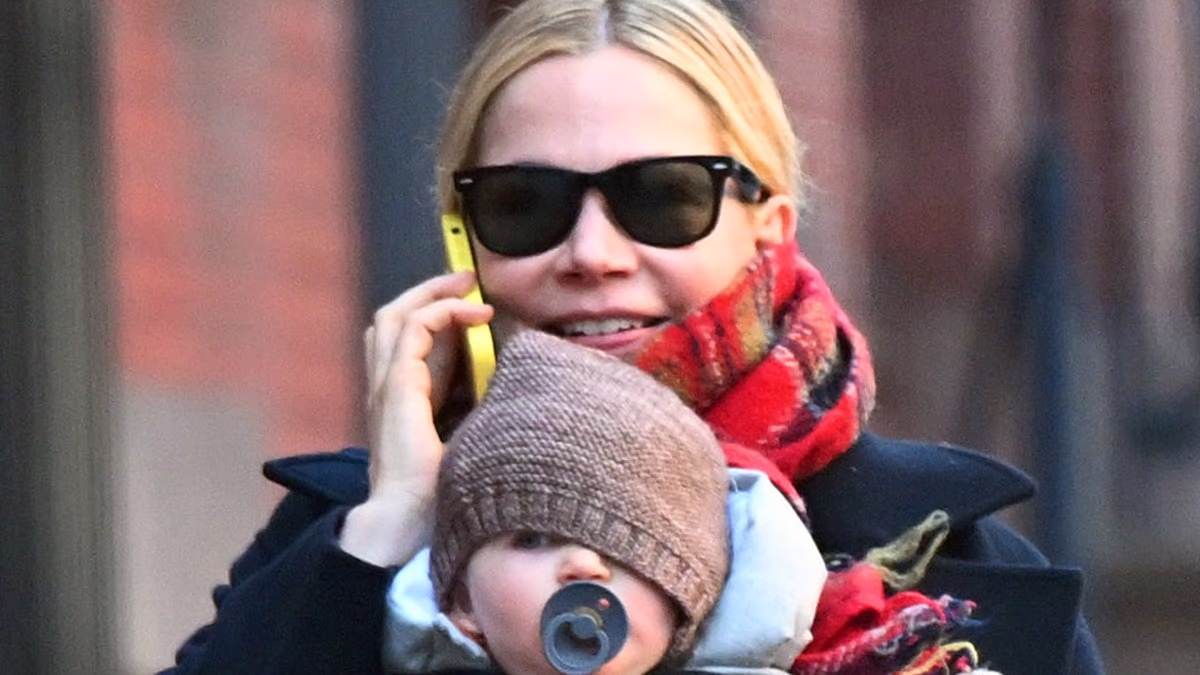Michelle Williams, 45, is seen with her new baby for the first time - five months after revealing she had quietly welcomed a fourth child via surrogate