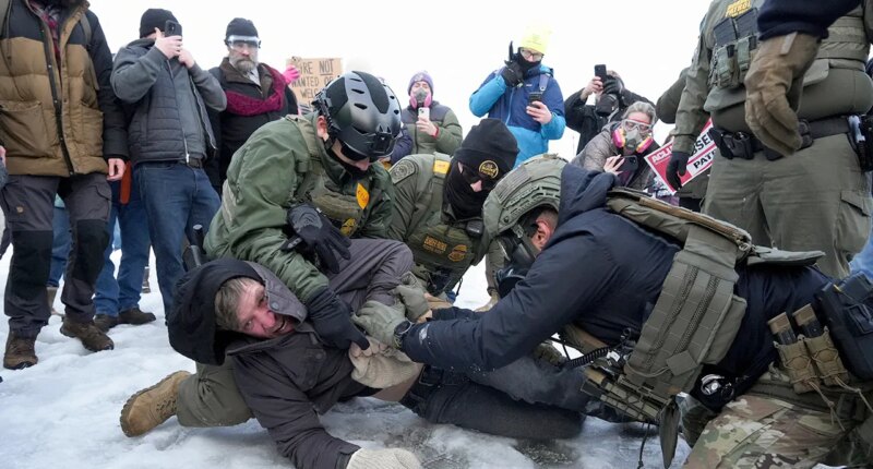 Minneapolis protesters confront federal agents day after deadly shooting