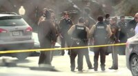 Multiple people injured after gunfire erupts at funeral home during teen's service with hundreds in attendance