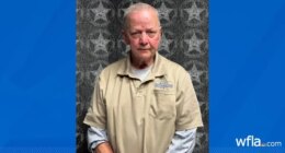 Neighbor arrested after man shot in driveway: sheriff