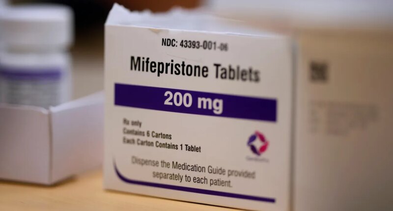 FILE - Mifepristone tablets sit on a table at a Planned Parenthood clinic in Ames, Iowa, July 18, 2024. (AP Photo/Charlie Neibergall, File)