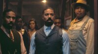 This image released by Warner Bros Pictures shows Michael B. Jordan, foreground from left, Michael B. Jordan and Omar Benson Miller in a scene from