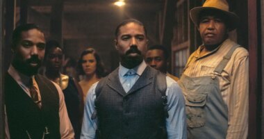 This image released by Warner Bros Pictures shows Michael B. Jordan, foreground from left, Michael B. Jordan and Omar Benson Miller in a scene from