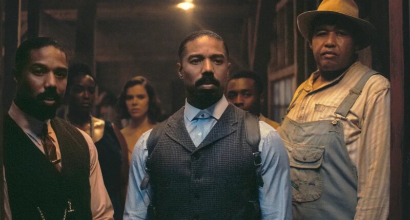 This image released by Warner Bros Pictures shows Michael B. Jordan, foreground from left, Michael B. Jordan and Omar Benson Miller in a scene from