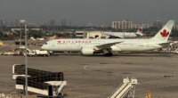 Passengers baffled and confused after screams burst from beneath taxiing Air Canada plane