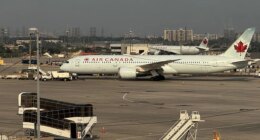 Passengers baffled and confused after screams burst from beneath taxiing Air Canada plane