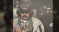 President Trump Posts Photo Allegedly Showing Captured Maduro Heading to U.S.