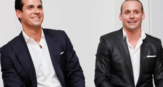 FILE - Oren and Tal Alexander speak at a panel at the Rockstars of Real Estate Event, Sept. 3, 2013 in New York. (Photo by Amy Sussman/Invision for DETAILS Magazine/AP Images, File)