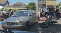 A damaged Mercedes-Benz that collided with an e-bike in Sydney's eastern suburbs.