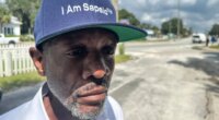 FILE - Jazz Watts, a resident of Sapelo Island, wears a hat that reads