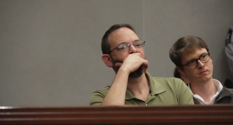 Rob Steele listens a prosecutor describes his fiancee Mary Marshalls