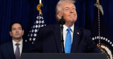 President Donald Trump listens to a question during a news conference at Mar-a-Lago, Saturday, Jan. 3, 2026, in Palm Beach, Fla., as Secretary of State Marco Rubio watches. (AP Photo/Alex Brandon)