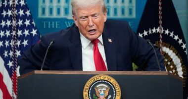 President Donald Trump listens to a question from a reporter during a press briefing at the White House in Washington, Tuesday, Jan. 20, 2026. (AP Photo/Mark Schiefelbein)
