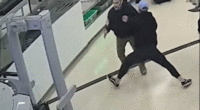 gif of bystander tackling man at airport