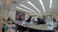 Video shows masked robbers crash car through jewelry store entrance, steal owner's gun in brazen heist