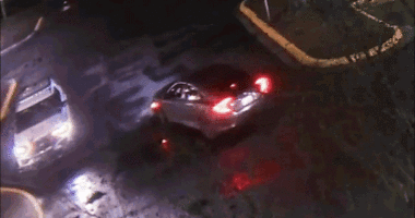 Video shows police officer ambushed in patrol car in explosion of gunfire; suspect found dead after shootout