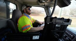 Austin Felts of the Nashville Department of Transportation drives a truck deploying salt brine on roadways Thursday, Jan. 22, 2026, in Nashville, Tenn. ahead of a winter storm expected to hit the state over the weekend. (AP Photo/George Walker IV)