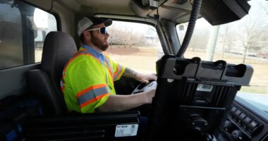 Austin Felts of the Nashville Department of Transportation drives a truck deploying salt brine on roadways Thursday, Jan. 22, 2026, in Nashville, Tenn. ahead of a winter storm expected to hit the state over the weekend. (AP Photo/George Walker IV)