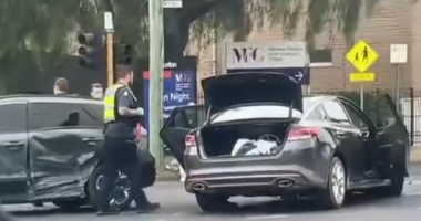 Police were seen taking at least one person from the scene.