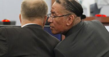 Nathan Chasing Horse, right, talks to his attorney Craig Mueller during his trial on charges of sexually abusing Indigenous women and girls Tuesday, Jan. 13, 2026, in Las Vegas. (AP Photo/Ty ONeil)