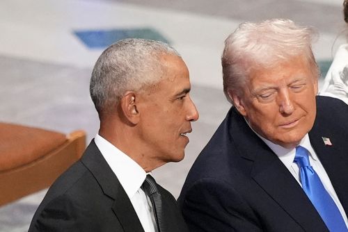 FILE - Former President Barack Obama talks with then President-elect Donald Trump as Melania Trump reads the funeral program before the state funeral for former President Jimmy Carter at Washington National Cathedral in Washington, Jan. 9, 2025. (AP Photo/Jacquelyn Martin, File)