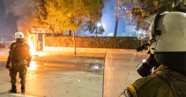 313 Arrested in University Raid After Mob Firebombed Police