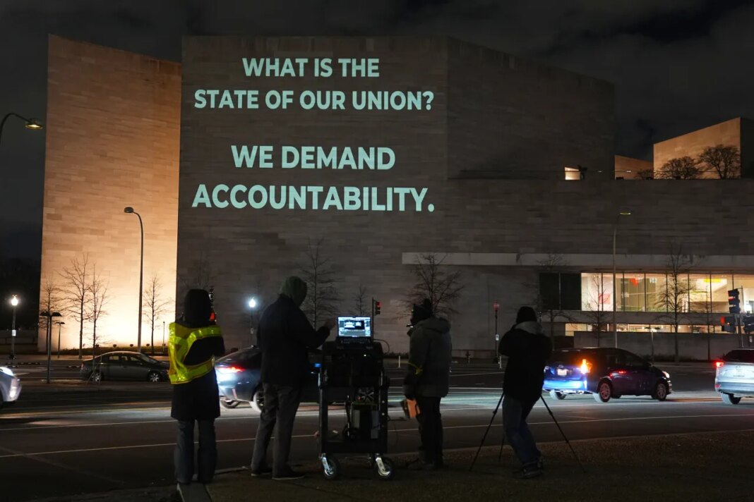 An image is projected onto the exterior wall of the National Gallery of Art near the U.S. Capitol in Washington, Monday, Feb. 23, 2026, ahead of President Donald Trump