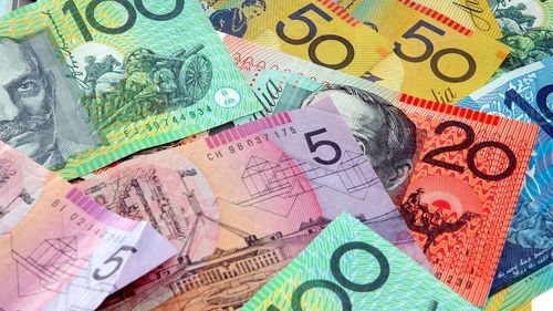 Australian notes scattered on a table. Australian money stock image